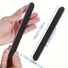 A hand holds a black dual-grit nail file, showing its dimensions and shape.