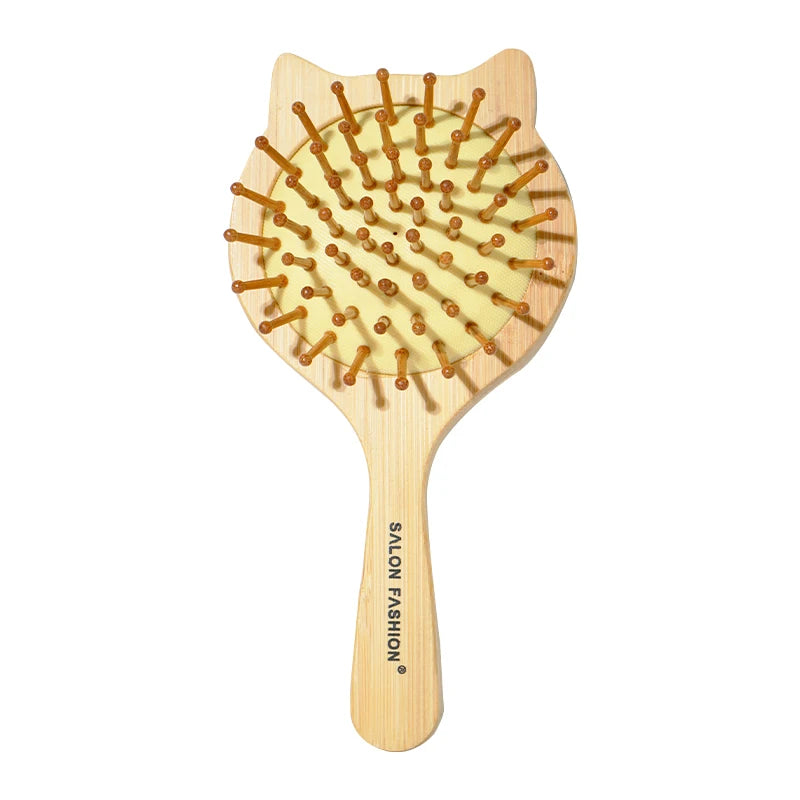 A wooden hair brush with numerous bristles is shown against a white background.