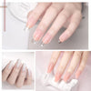 Close-up of a hand displaying flawless, long acrylic nails with various colored gel extensions.