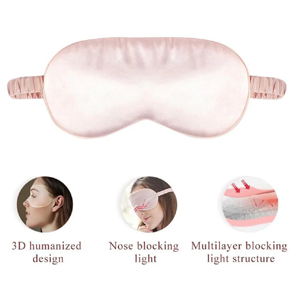 Masque de sommeil en soie rose avec design humain, blocage de lumière et structure multi-couches.