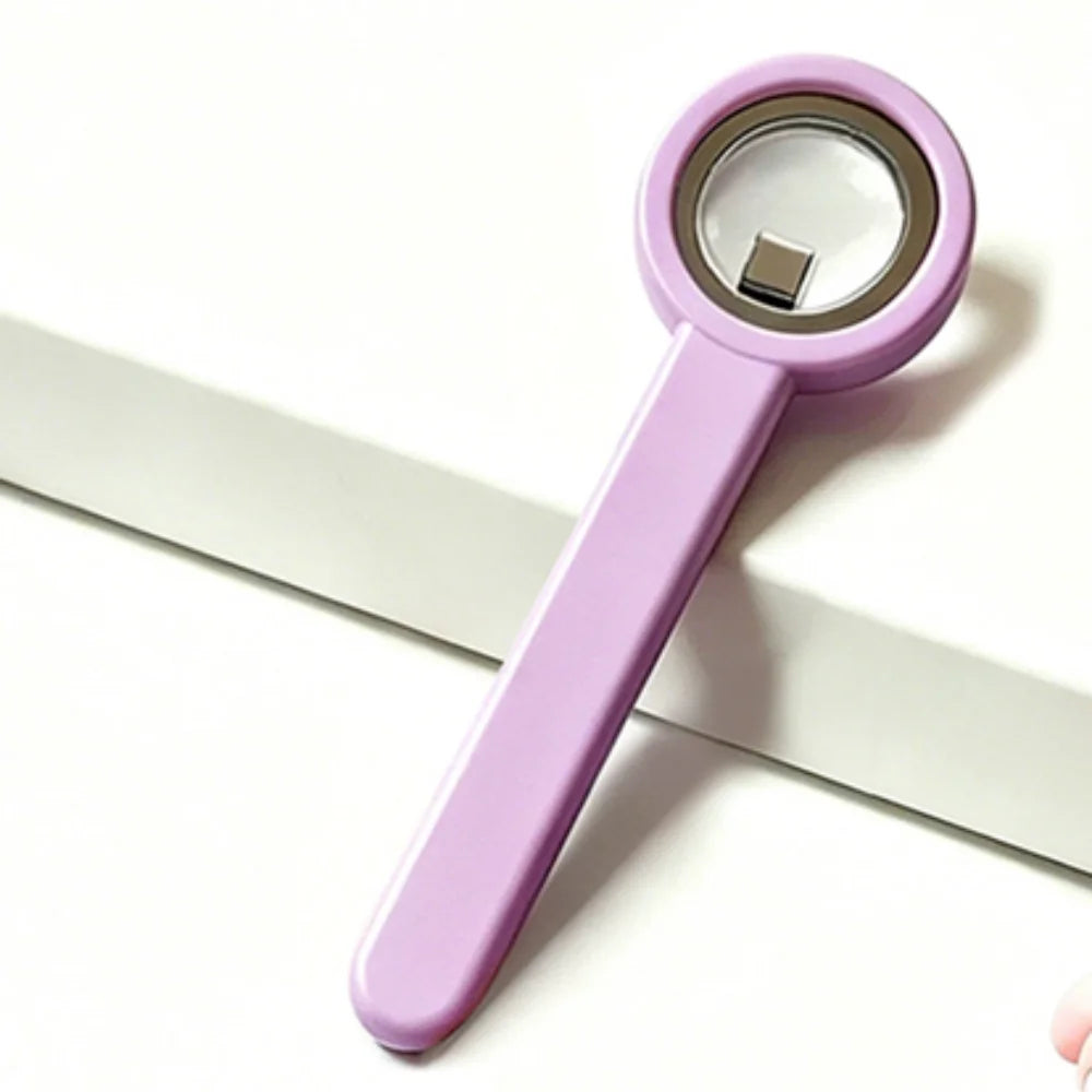 A pink magnetic nail art stick with a clear top is shown against a white background.