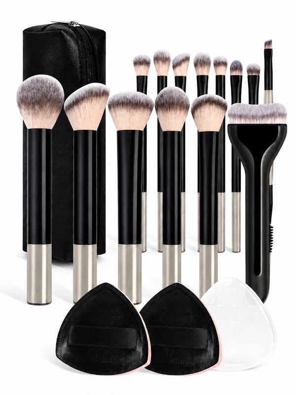 A set of complete makeup brushes with soft bristles shown in various shades and sizes.