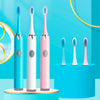 Three sonic electric toothbrushes with replaceable heads in blue, white, and pink standing on a light blue base.
