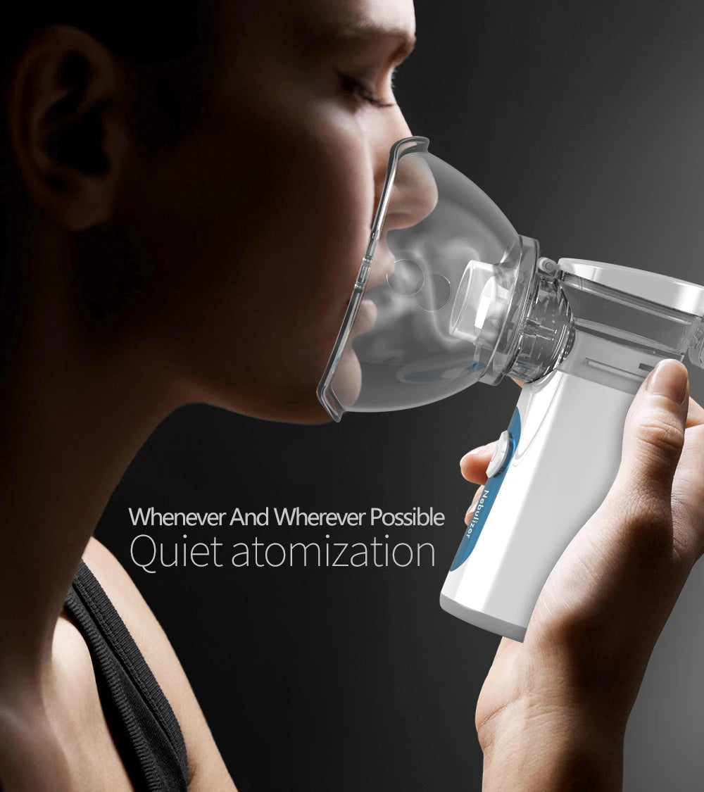 A person is using a white portable nebulizer device to receive quiet atomization.
