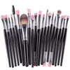 A collection of 20 professional makeup brushes in various sizes and colors.