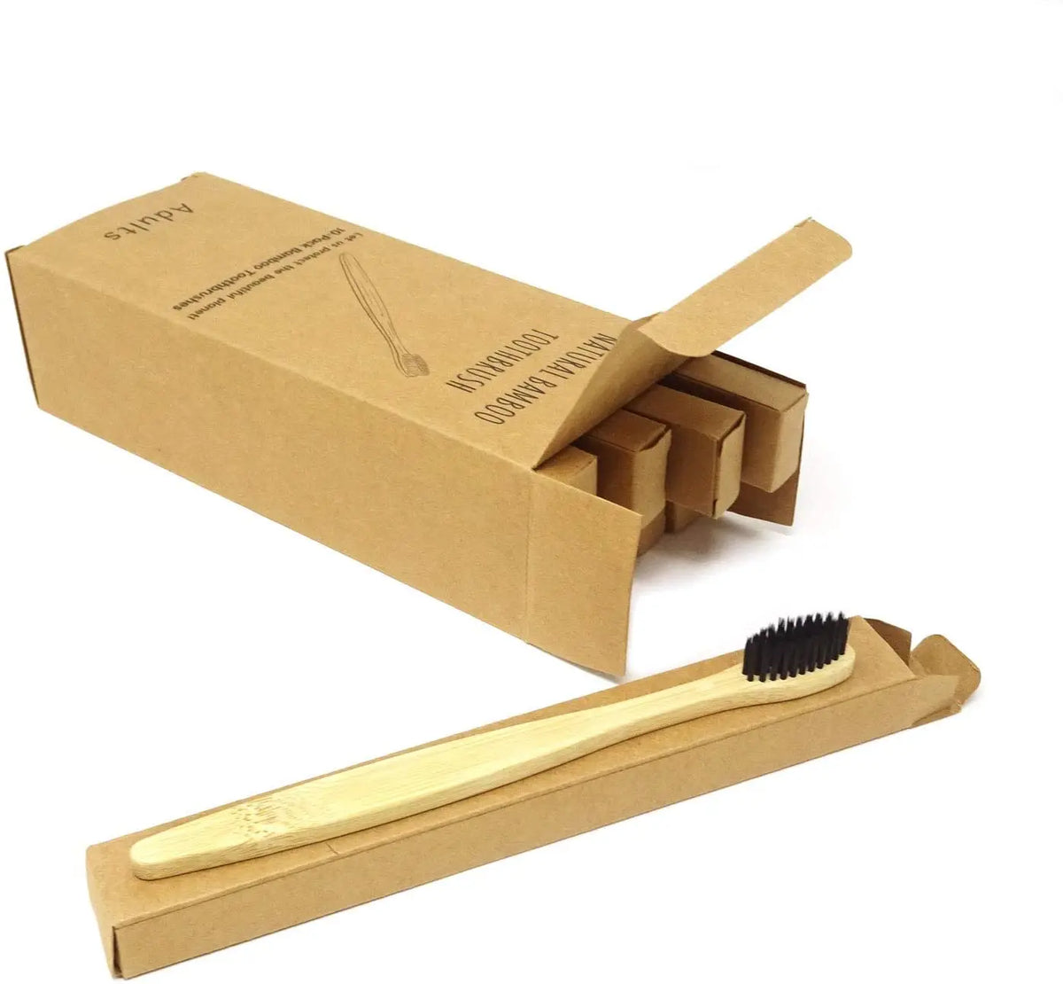 A cardboard box containing a set of bamboo toothbrushes and a wooden toothbrush displayed on a white background.