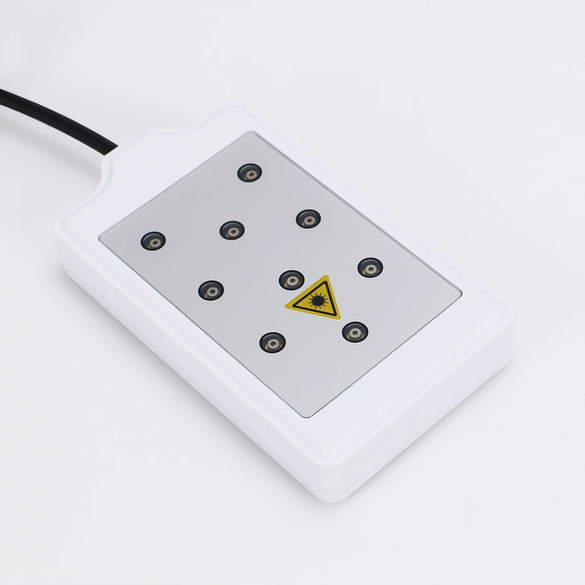 A white ultrasonic body sculpting massager device with a yellow triangle symbol on the surface.