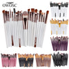 A collection of 20 professional makeup brushes in various sizes and colors displayed on a white background.