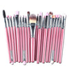 A collection of 20 professional makeup brushes in pink and black housed in a set.