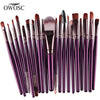 A collection of 20 professional makeup brushes in various shades and sizes.
