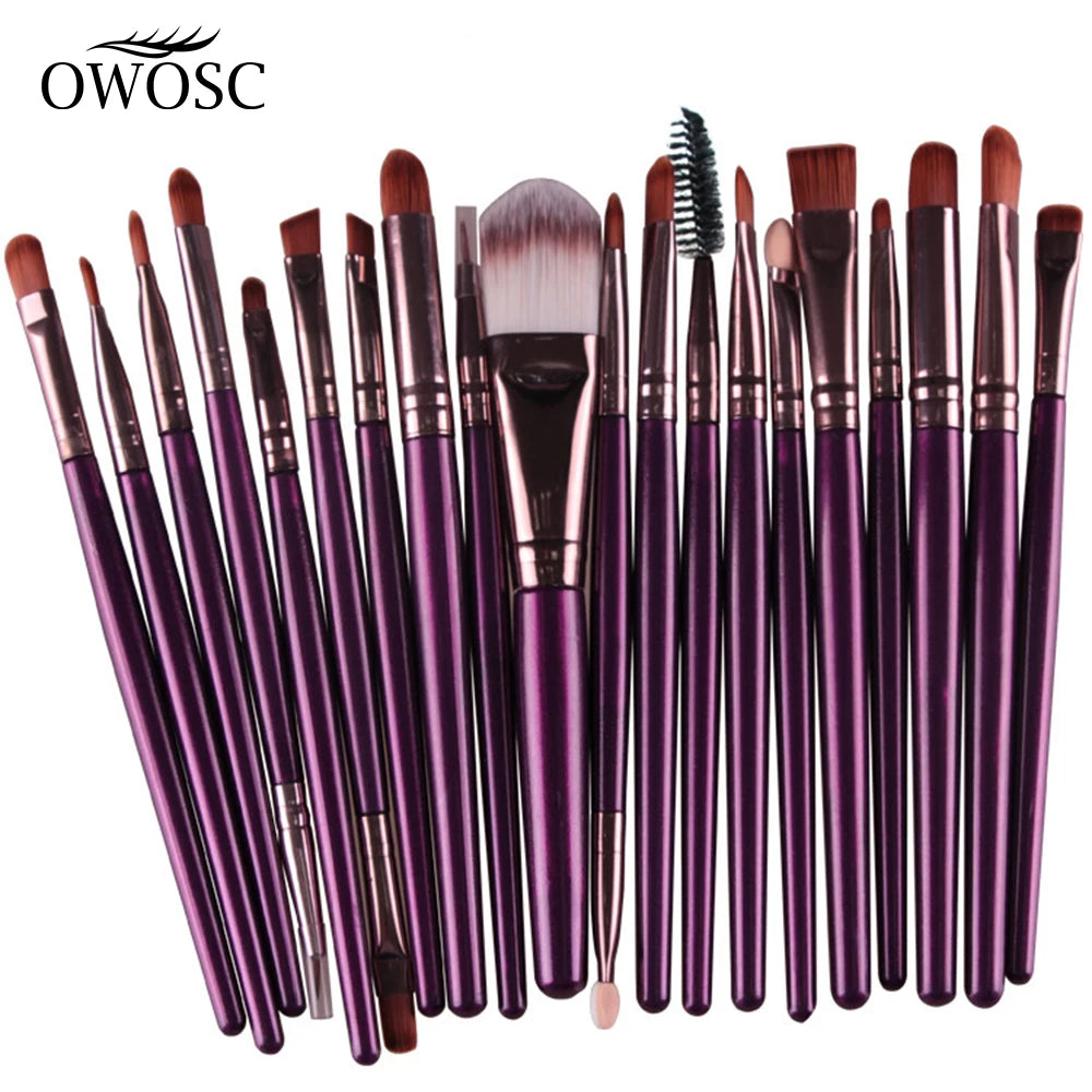 A collection of 20 professional makeup brushes in various shades and sizes.
