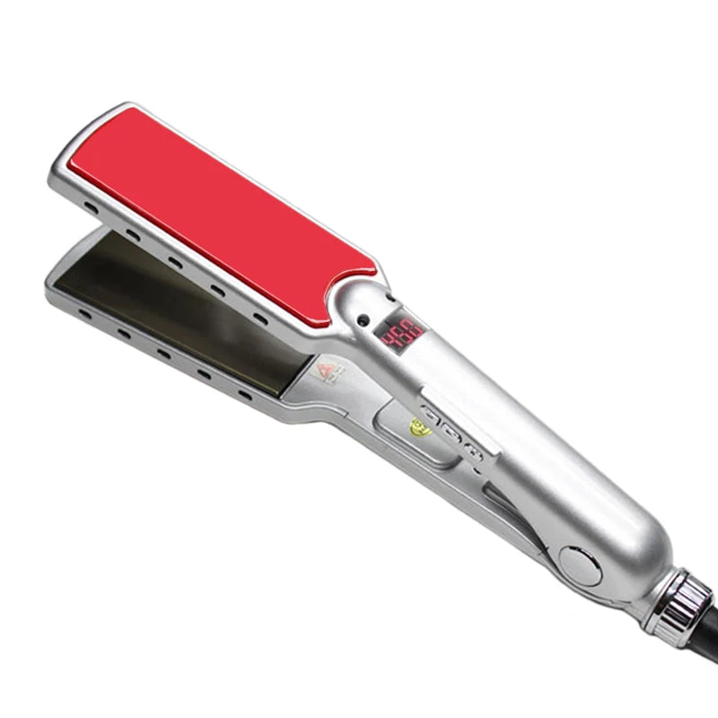 A silver hair straightener with a red ceramic plate and digital temperature display.