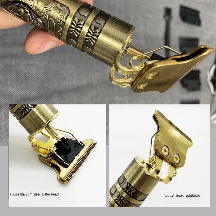 Close-up of a gold-colored electric hair trimmer cutter head with a black blade and brass accents.