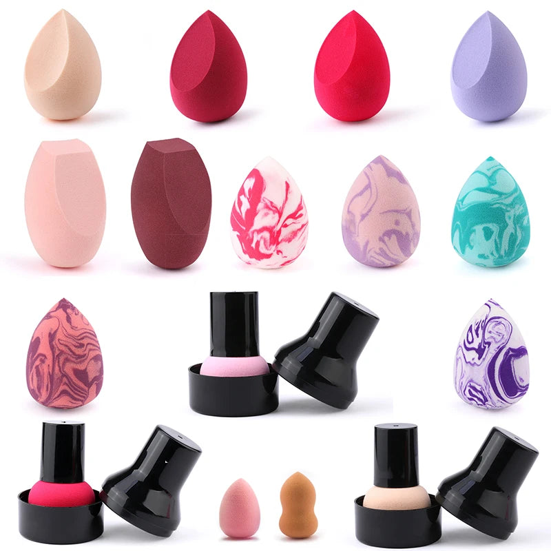 A collection of various colored makeup sponge puffs and applicators shown in different shades and angles.