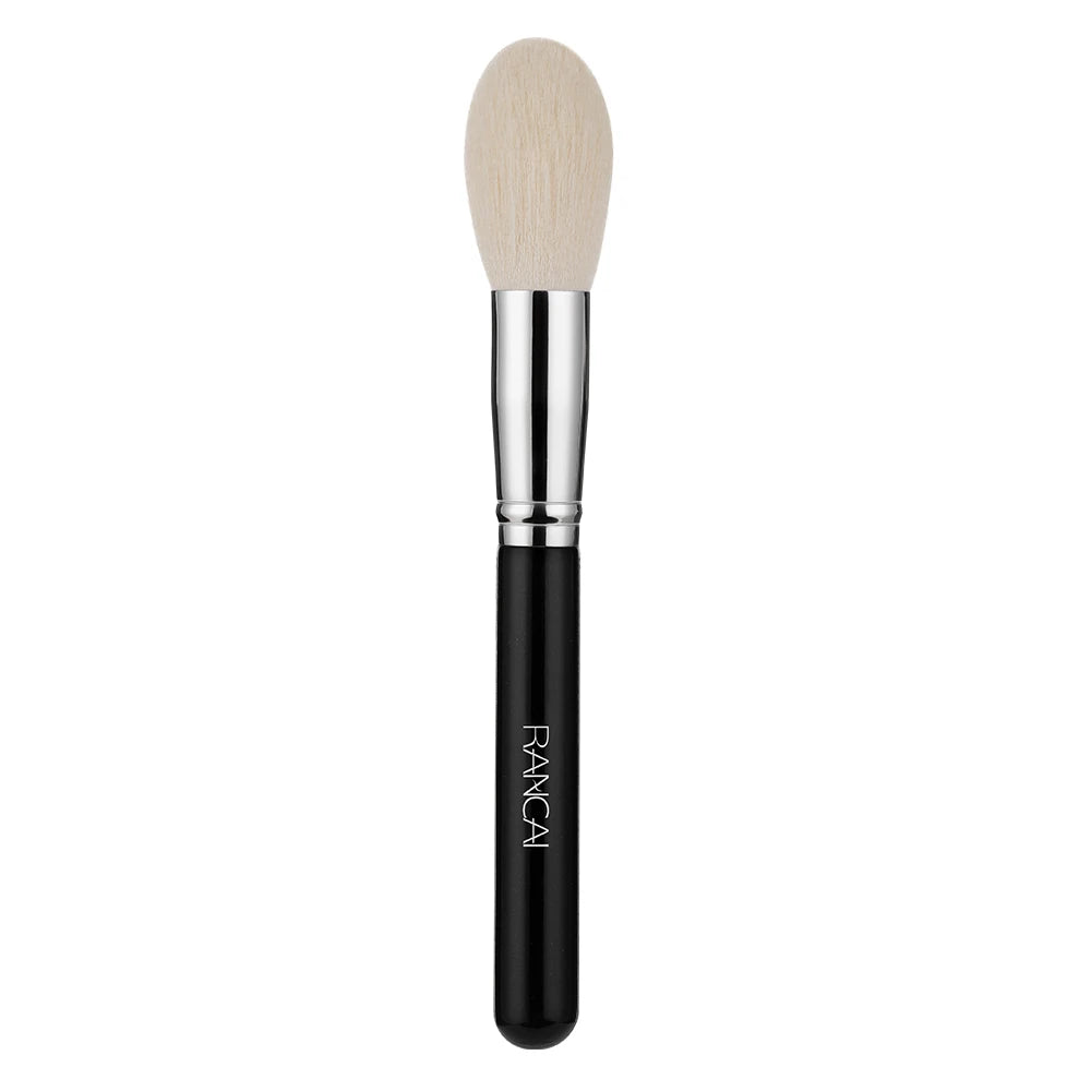 A flat top kabuki foundation brush with a natural hair color and silver ferrule and handle.
