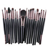 A collection of 20 professional makeup brushes in various sizes and shades.