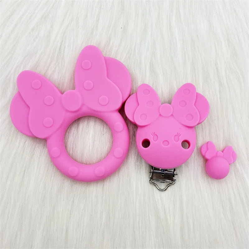 Perles en silicone roses en forme de papillon et de visage pour le soin oral du bébé