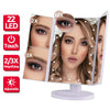 An LED vanity makeup mirror with touch control and adjustable magnification showing a close-up of a woman's face.