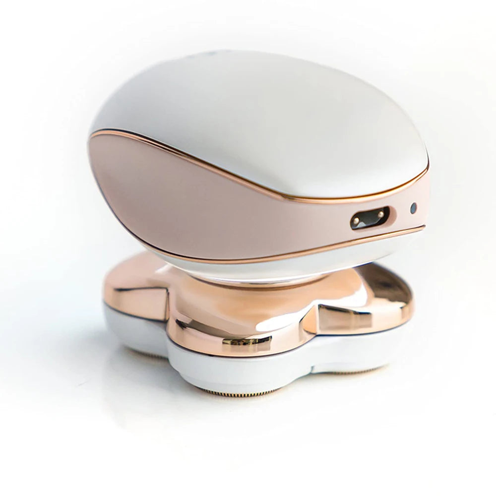 Depiladora eléctrica multi-cabeza blanca y oro rosa de rosa.
