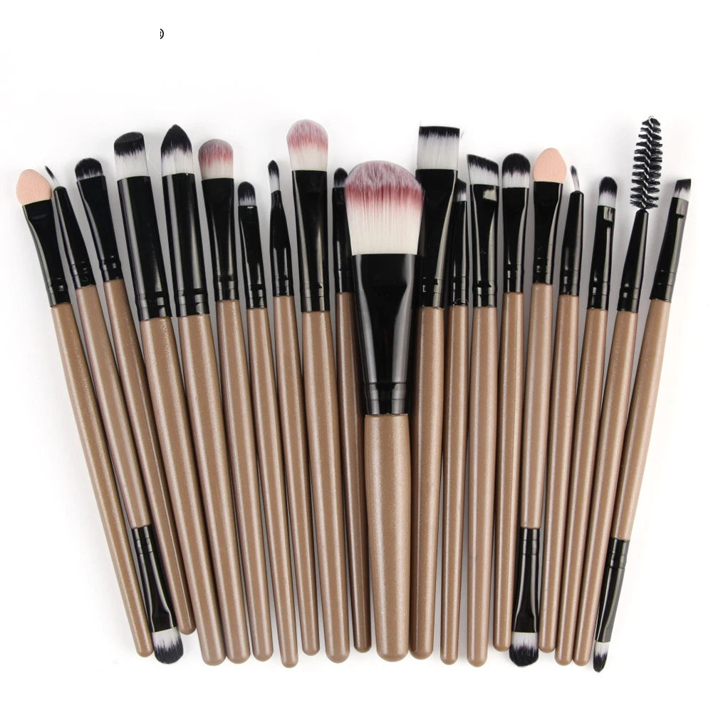 A collection of 20 professional makeup brushes in various sizes and shades arranged horizontally.