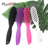 A set of four professional multi-function hair styling combs in black, purple, pink, and white displayed on a green leaf.
