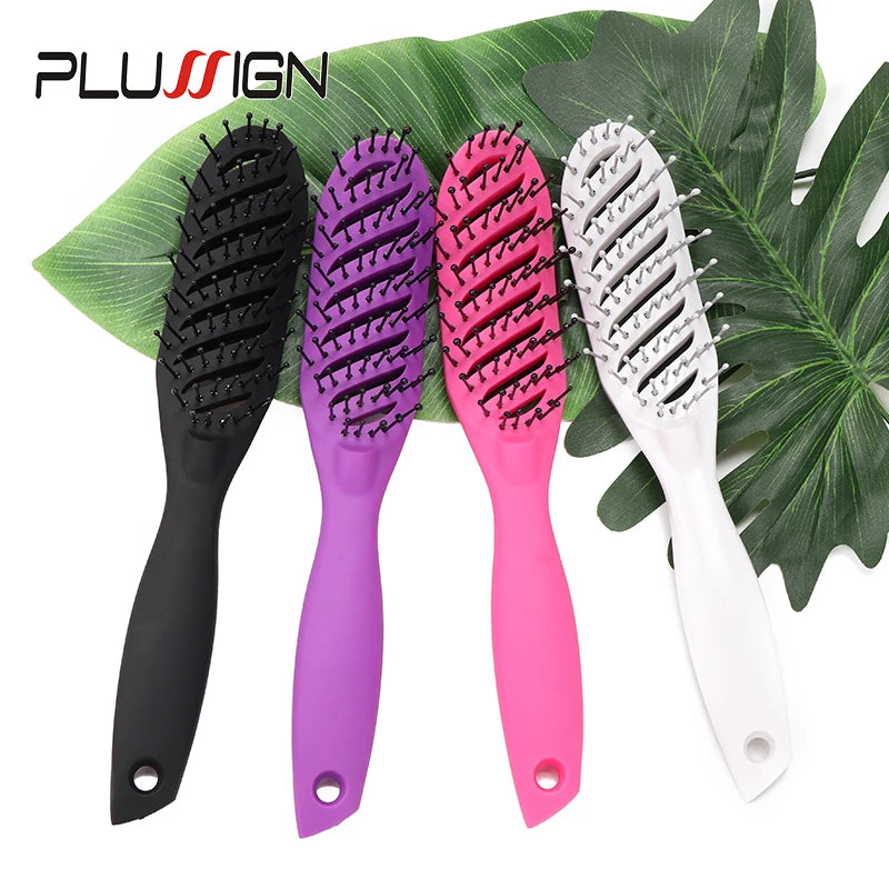 A set of four professional multi-function hair styling combs in black, purple, pink, and white displayed on a green leaf.