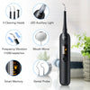 A black electric dental scaling and whitening tool with various attachments shown next to the main device.