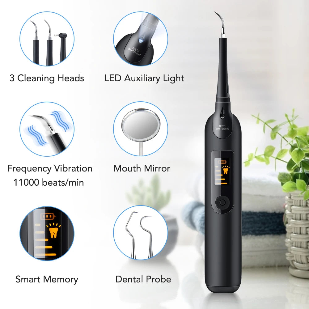A black electric dental scaling and whitening tool with various attachments shown next to the main device.