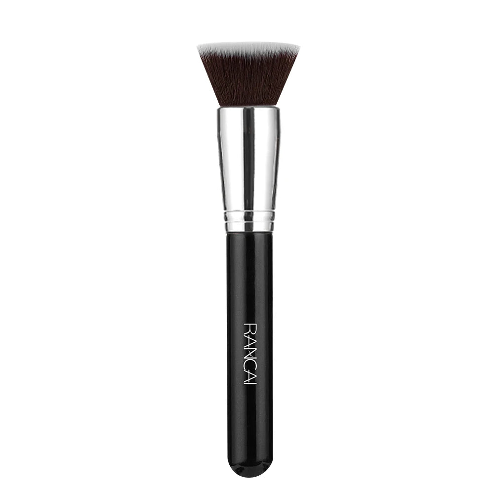 A silver flat top kabuki foundation brush with a dark handle and brown bristles.