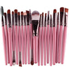 A collection of 20 professional makeup brushes in pink and black shades.