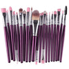A collection of 20 professional makeup brushes in various shades and sizes.