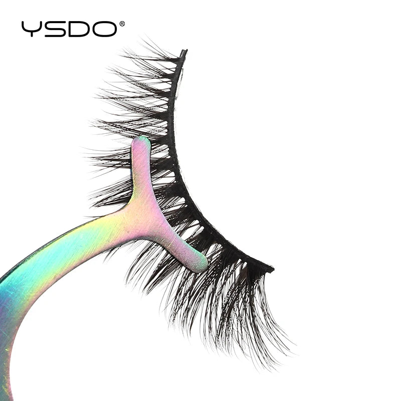 Stainless steel eyelash tweezers used to apply false lashes.