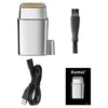 A silver electric shaver with a black cord and charging base is shown.