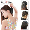 A woman is using a black hair styling comb on her hair, demonstrating the product.