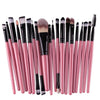 A set of twenty professional makeup brushes in a pink and black color scheme.