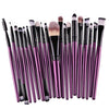 A collection of 20 professional makeup brushes with varying sizes and shades arranged in a row.