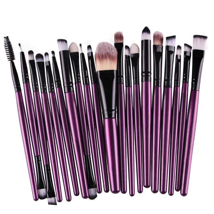 A collection of 20 professional makeup brushes with varying sizes and shades arranged in a row.