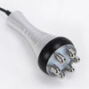 A silver and black ultrasonic body sculpting massager with a cord and multiple metal tips.