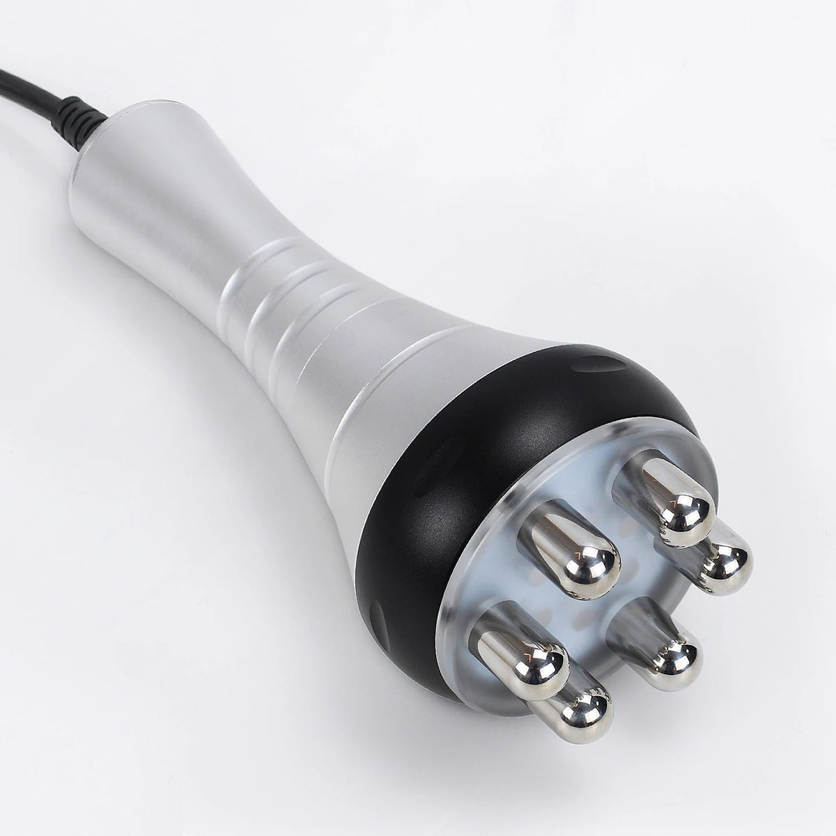 A silver and black ultrasonic body sculpting massager with a cord and multiple metal tips.