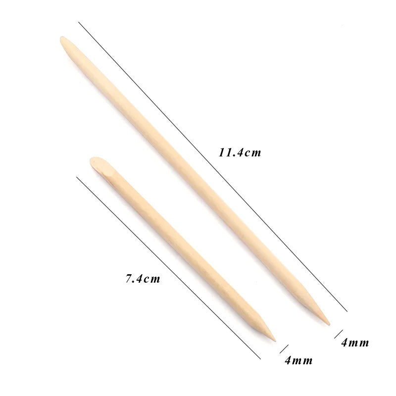 Two natural wood nail art pusher sticks shown with measurements.
