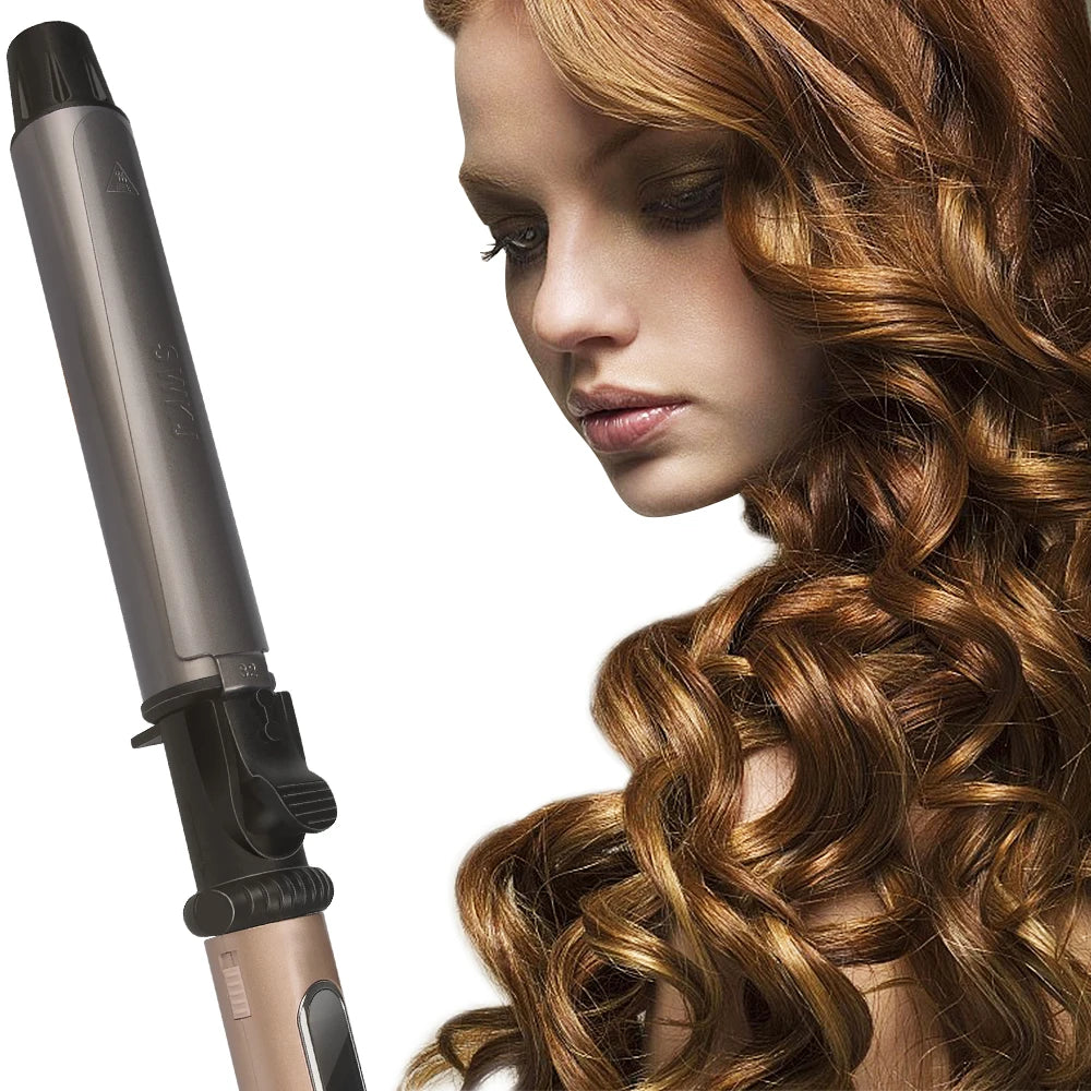 A woman's hair is being styled with a professional nano titanium curling iron.