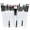 A collection of 20 professional makeup brushes with black and white handles and various hair-like bristles.