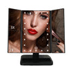 An LED vanity makeup mirror showing a woman's face with adjustable magnification features like 3X and 2X.