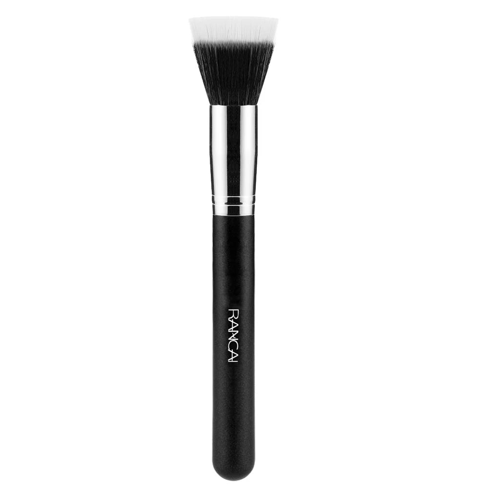 A black flat top kabuki foundation brush with a dense synthetic hair bristles.