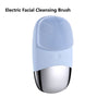 A light blue electric facial cleansing brush with a silver head and body.