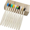 A box containing a set of twenty natural bamboo toothbrushes with various colored bristles.