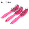 A set of three pink plastic hair styling combs with black teeth shown against a white background.