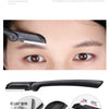 Outil professionnel noir pour tailler les sourcils, montrant son design et sa fonction de façonnage.