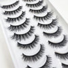 A display of natural 3D mink false eyelashes in various styles and lengths.