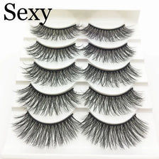A set of luxury 3D mink false eyelashes displayed on a white background.